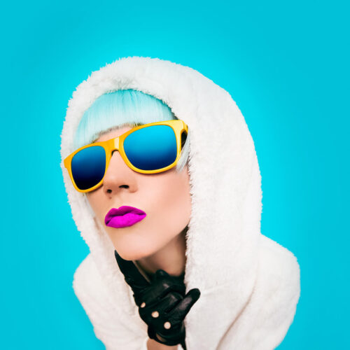 fashion-girl-in-a-white-hoodie-on-a-blue-backgroun-2024-09-18-10-38-10-utc