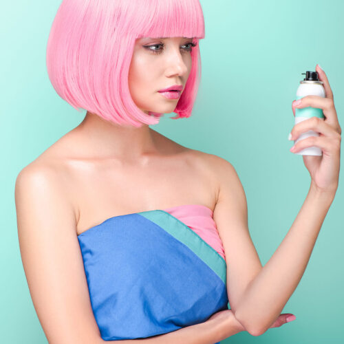 stylish-young-woman-with-pink-bob-cut-holding-colo-2023-11-27-04-50-13-utc