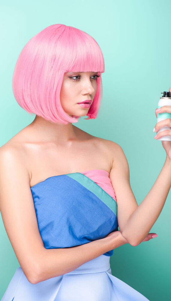 stylish-young-woman-with-pink-bob-cut-holding-colo-2023-11-27-04-50-13-utc