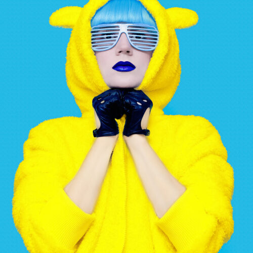 teddy-bear-crazy-girl-in-a-bright-hoodie-on-a-blue-2024-09-12-09-34-34-utc