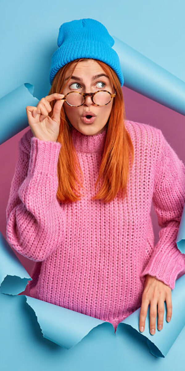 beautiful-surprised-woman-with-red-hair-looks-asto-2023-11-27-05-08-52-utc