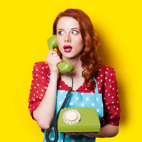 beautiful-surprised-young-woman-with-retro-phone-o-2024-09-25-07-11-11-utc