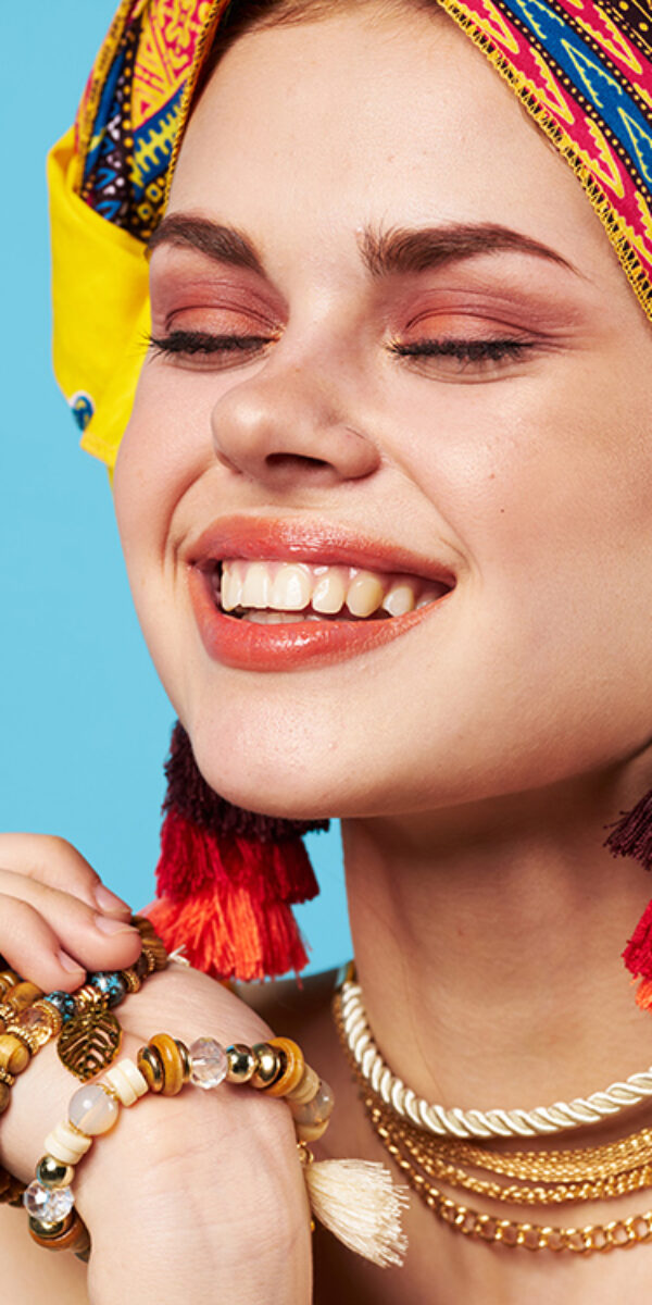 cheerful woman multicolored shawl ethnicity african style decorations Studio Model. High quality photo
