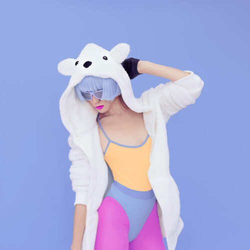 crazy-girl-in-hoodie-teddy-bear-on-a-blue-backgrou-2024-09-17-07-59-20-utc