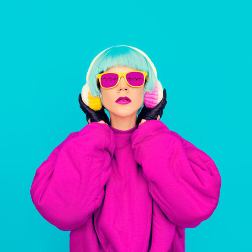 glamorous-fashion-lady-in-bright-clothes-listening-2024-09-19-10-27-37-utc
