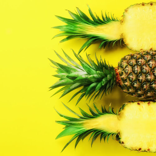 pattern-with-bright-pineapples-on-yellow-backgroun-2023-11-27-05-14-44-utc