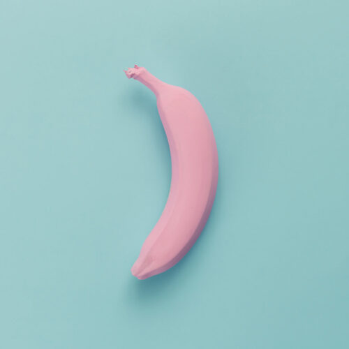 pink-banana-on-blue-pastel-background-minimal-sty-2024-09-18-07-31-11-utc