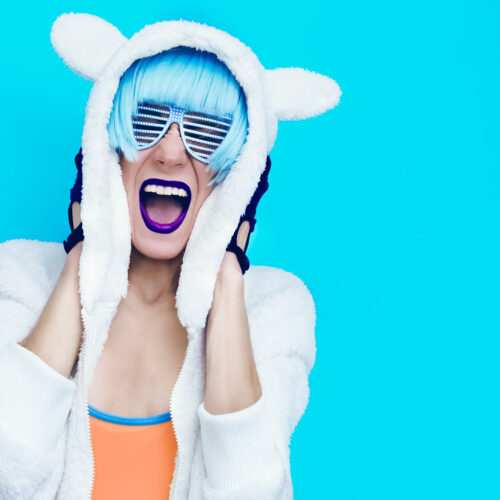 screaming-crazy-girl-in-hoodie-teddy-bear-on-a-blu-2024-09-12-10-11-33-utc