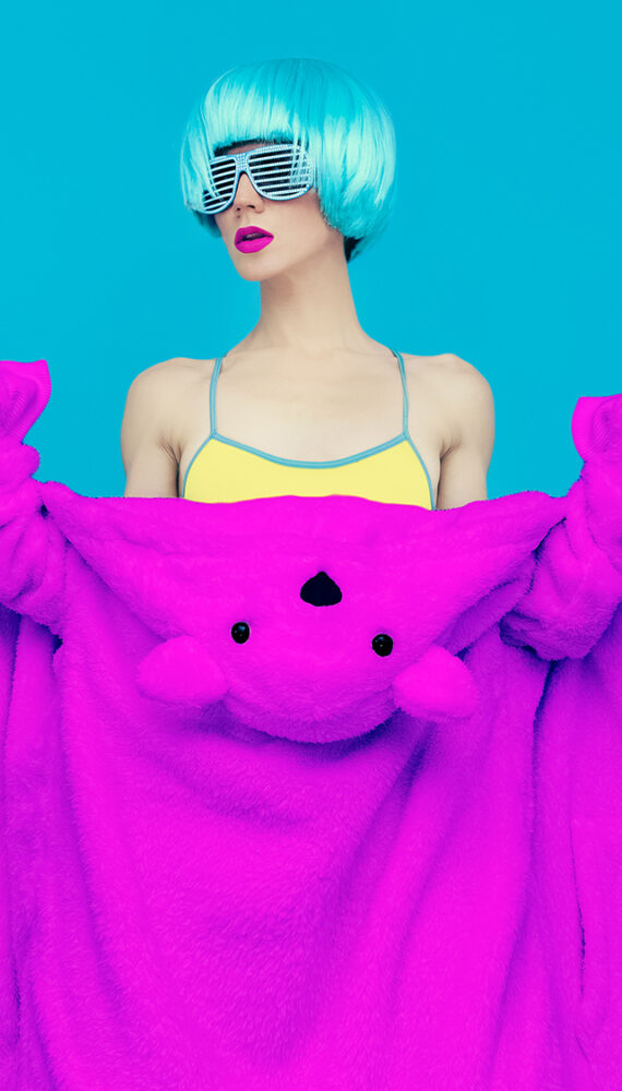 teddy bear girl on a blue background. Crazy winter party. Club dance style